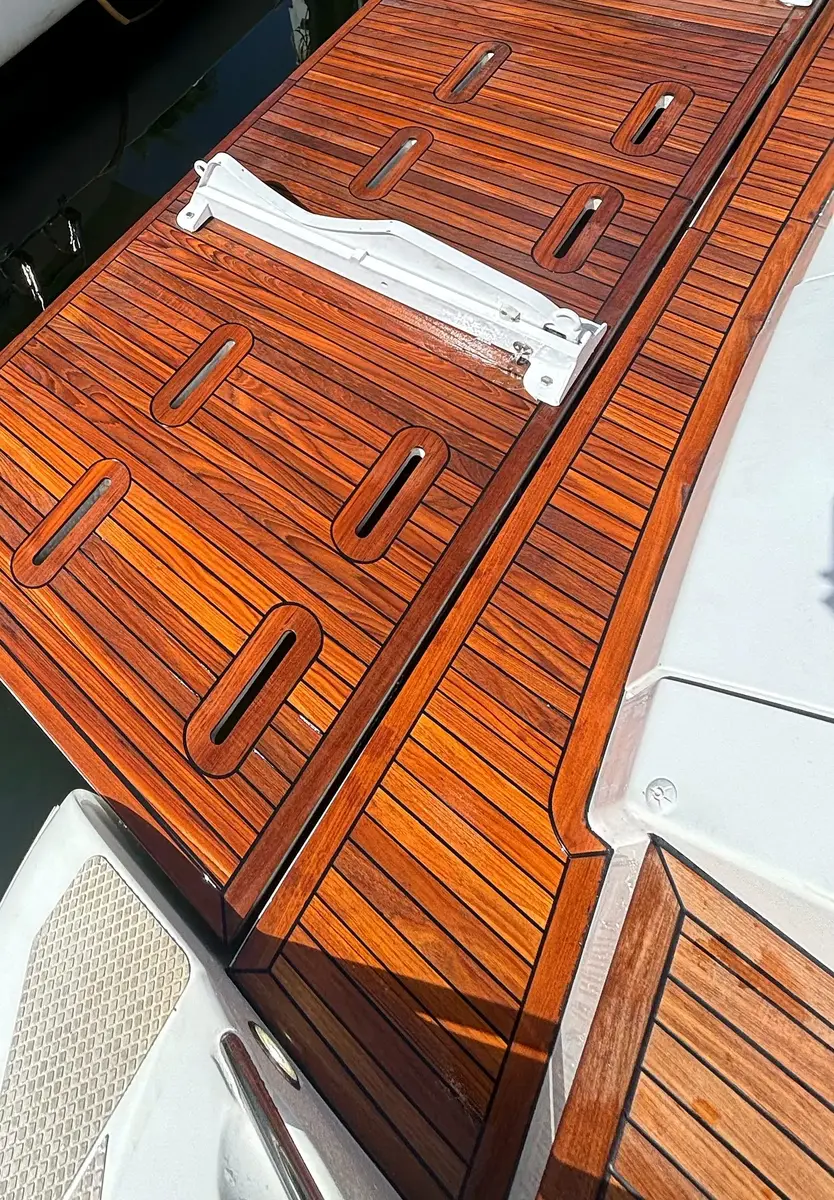 New teak swim platform installed on a motor yacht